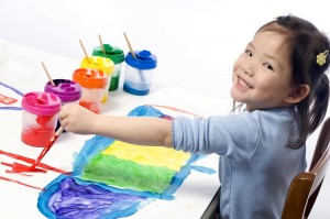 Preschooler with Paints